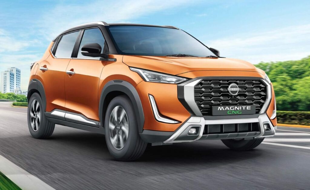 Orange Nissan Magnite AMT CNG on road