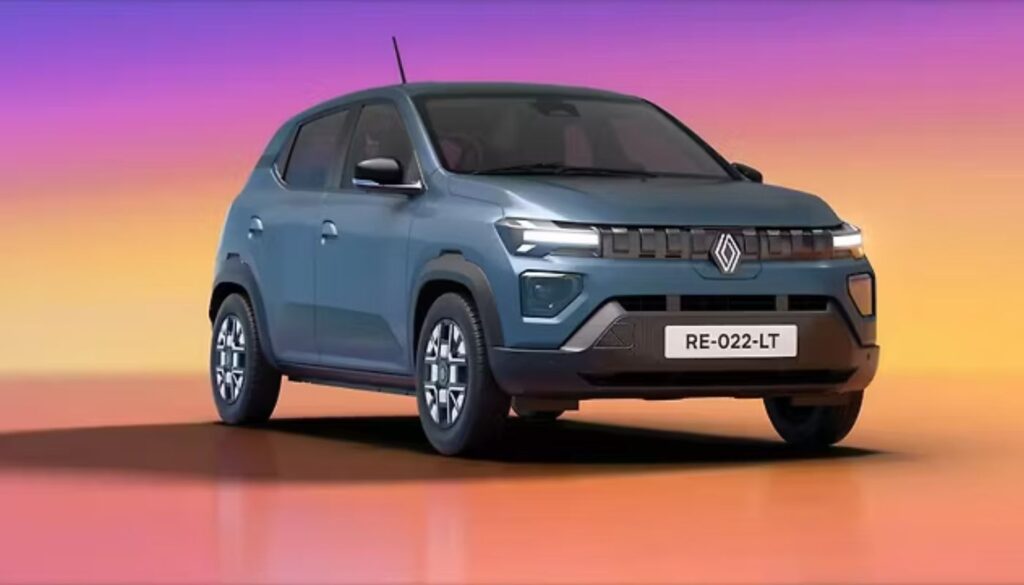 ग्रेडिएंट बैकग्राउंड पर Renault Kwid EV का आकर्षक फ्रंट व्यू। इसकी इलेक्ट्रिक पहचान DRLs और 6 एयरबैग जैसे सेफ्टी फीचर्स के साथ स्पष्ट है। यह Renault Kwid EV भारतीय ग्राहकों के लिए एक किफायती और सुरक्षित इलेक्ट्रिक विकल्प है।