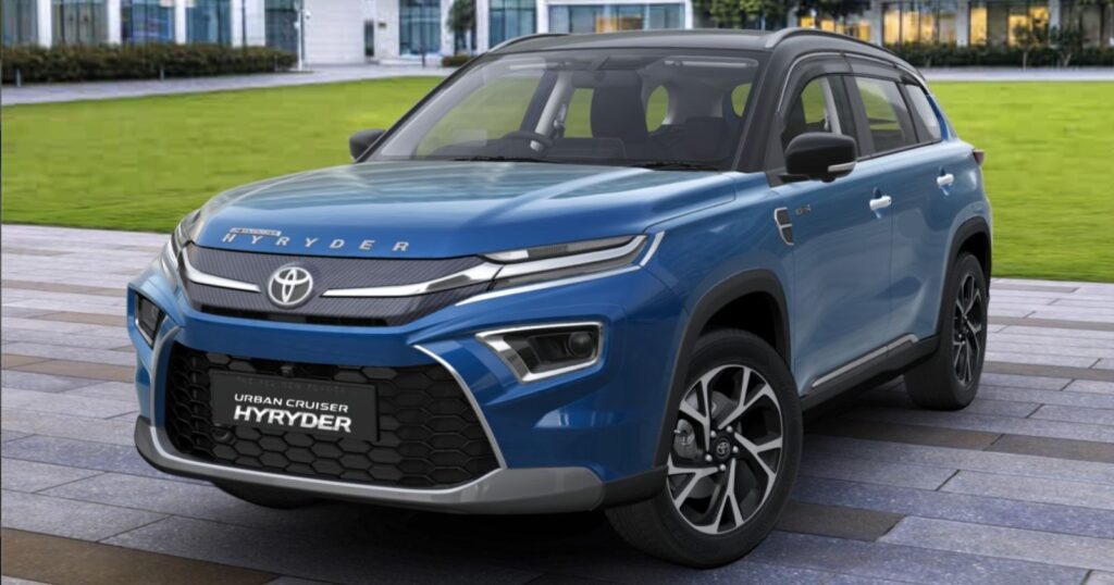 Toyota Sep 2025 Sales Analysis: एक नीले रंग की टोयोटा अर्बन क्रूजर हाइराइडर (Urban Cruiser Hyryder) एसयूवी का फ्रंट व्यू। सितंबर 2025 में टोयोटा की बिक्री वृद्धि में हाइराइडर का मजबूत योगदान रहा।